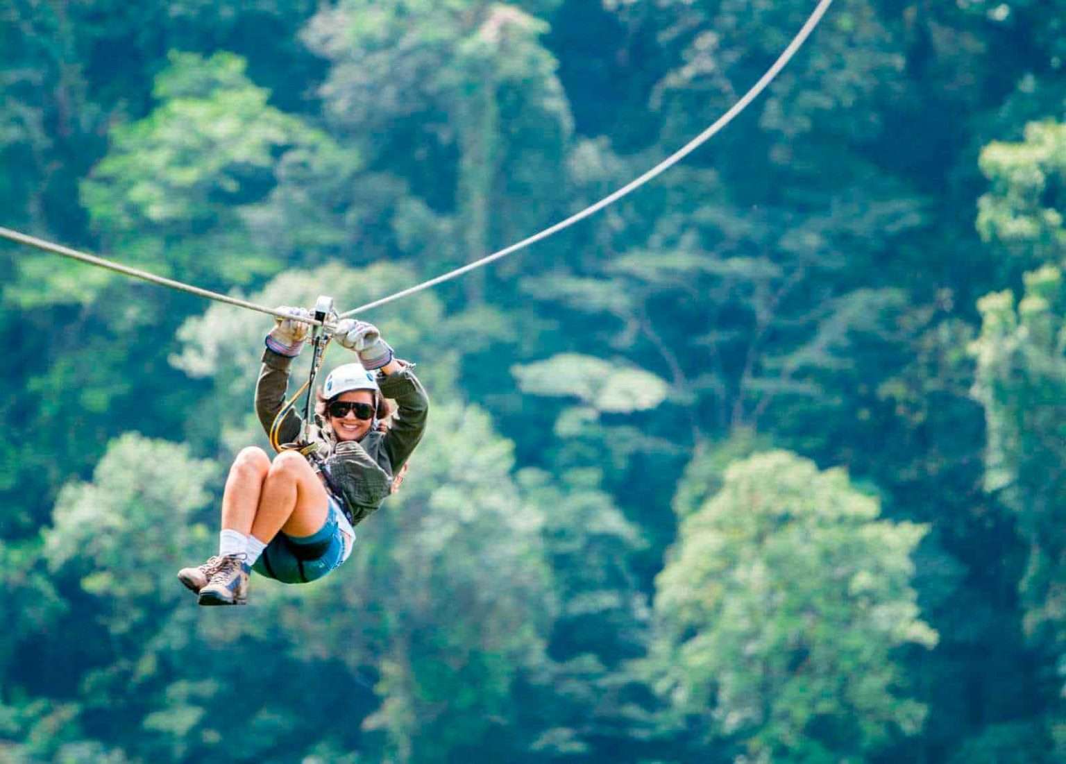 Ziplining through the rainforest during outdoor adventures in Costa Rica