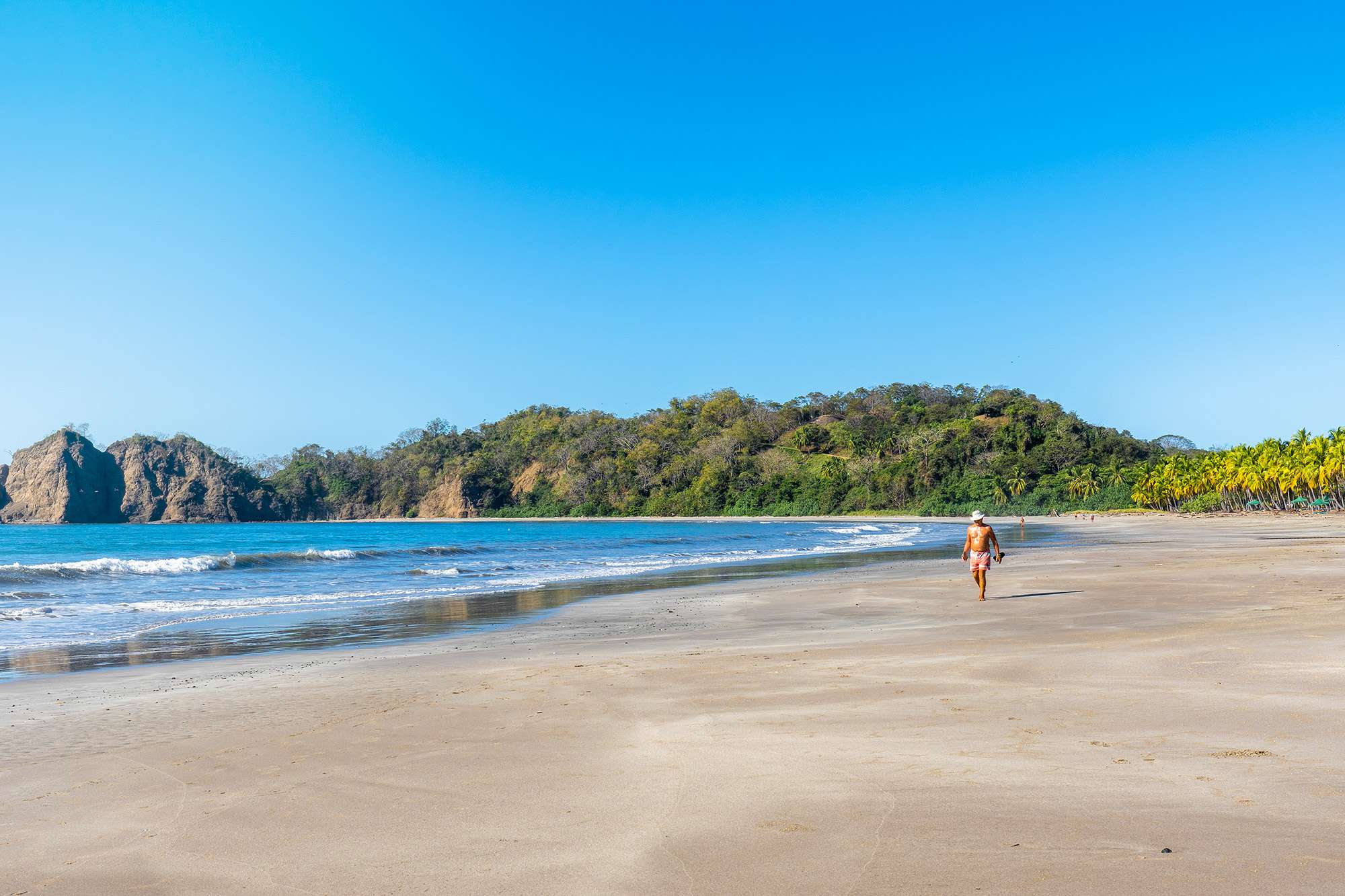 Luxury coastal home in Playa Carrillo, Costa Rica, surrounded by lush greenery and ocean views